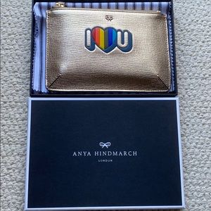 Anya Hindmarch pale gold clutch